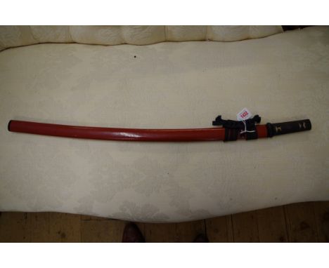 A good Japanese Wakizashi,&nbsp;with inscribed tang, length including tang 51.5cm, with associated red lacquered scabbard.&nb