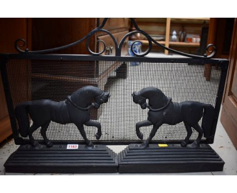 A cast and wrought iron fire screen,&nbsp;62cm wide. 