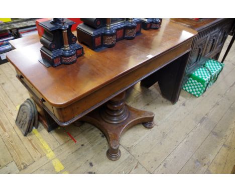 An unusual 19th century mahogany pedestal sofa table,&nbsp;with a pair of opposing lateral frieze drawers, 110cm wide. 