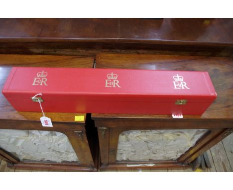 A manuscript vellum Coat of Arms document to Sir Harry Broadhurst, in red box. 