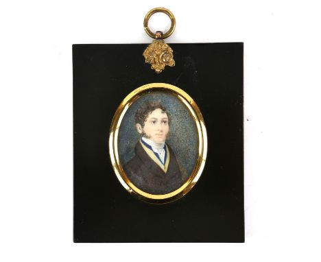 Portrait miniature of a gentleman with brown hair, in an ebonised  frame measuring 12 x 10cm 