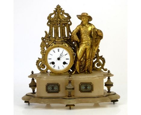 AMEDNDED DESCRIPTION Late 19th century French gilt metal and alabaster mantel clock, with gilt metal musketeer standing by wh