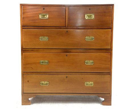 20th century mahogany campaign style chest, with two short over three long drawers on bracket feet, bearing plaque 'Presented