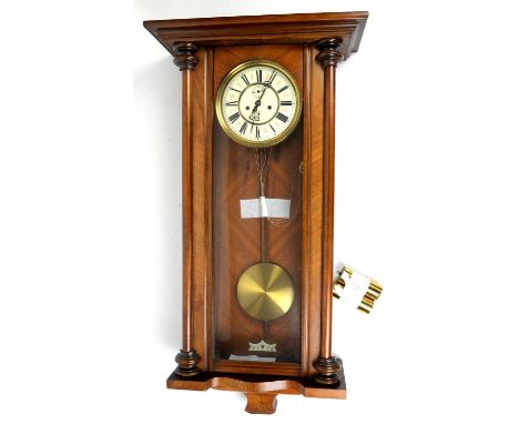 Gustav Becker walnut cased Vienna style wall clock, the dial with Roman numerals, makers mark to dial centre, striking gong a