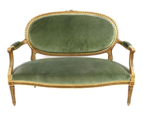 19th century French giltwood sofa, with green velvet upholstery, with floral top rail above acanthus carved armrests, on reed