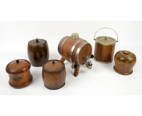 Oak model cask whisky decanter with tap, an oak biscuit barrel with inset plaque to base reading 'Harrods Manufacturing Silve