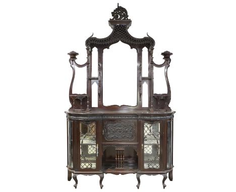 Victorian mahogany mirrored back cabinet, the ornate gallery back with C-scroll finial and lattice work supported by floral c