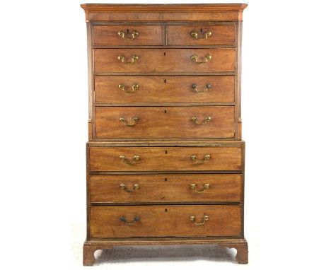 Mahogany tallboy of two short over six long drawers, on bracket feet, h172cm x w106cm x d56cm,