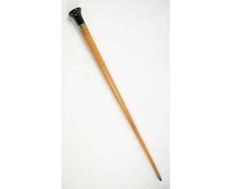 Late 19th century malacca swordstick with brass mounted black handle, 91cm long,