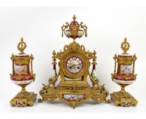 19th century French gilt metal clock garniture, the clock with painted dial with Roman numerals and riverside scene to centre