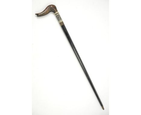 Late 19th century ebonised and bone mounted Indian swordstick with carved hardwood handle, 91cm long,