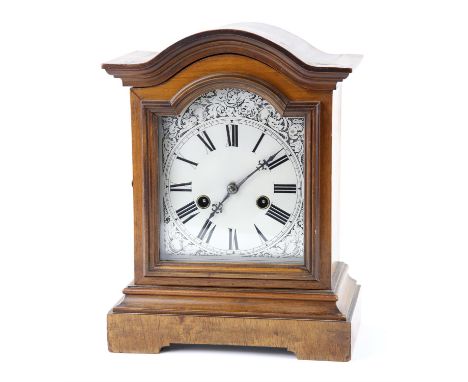 Early 20th century eight day walnut bracket clock by Hamburg American Clock Company, twin train movement, the silvered dial w