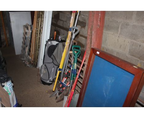 A quantity of long handled gardening tools etc. 