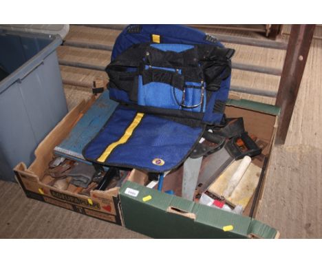 Two boxes of various hand tools and a Fosters bag 