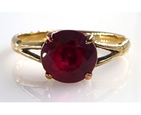 Gold Dress Ring with a single facet cut ruby stamped 9ct Condition Report & Further Details Ring size approximately LClick he