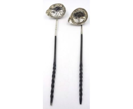 George III silver toddy ladle with twisted baleen handle makers mark T.M, London 1782 and one similar with coin dated 1679 (2