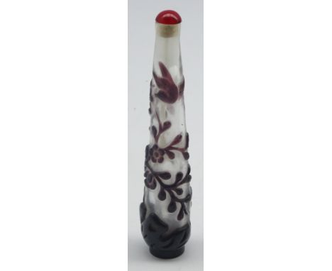 Chinese overlaid amethyst glass snuff bottle decorated with birds and trees and with ivory spoon H 13cm Condition Report & Fu