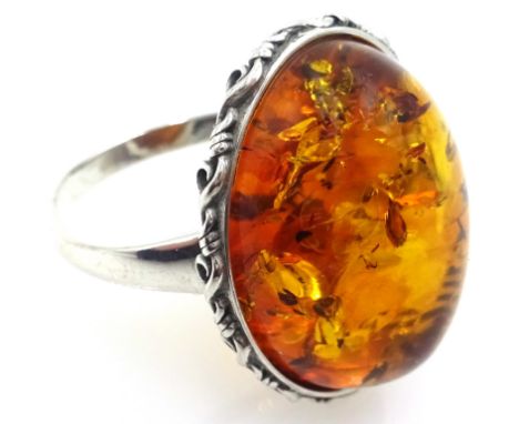 Silver, Baltic amber ring stamped 925 Condition Report & Further Details Click here for further images, condition, auction ti