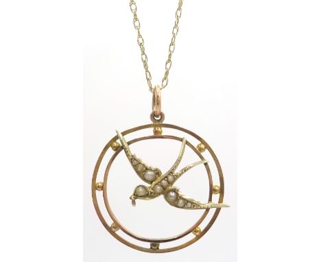 9ct gold circuit pendant with seed pearl set, swallow within pierced border on fine link neck chain Condition Report & Furthe