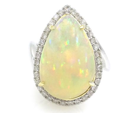 18ct white gold pear shaped opal and diamond cluster ring, stamped 750, opal 4.4 carat Condition Report & Further Details Dia