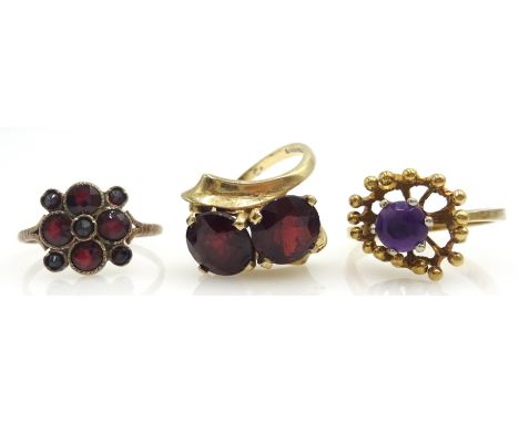 9ct gold two stone garnet ring hallmarked, garnet ring stamped GOLD, and an amethyst ring stamped 585 Condition Report & Furt