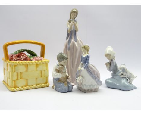 Two Lladro figures 'Evita' & 'Dog & Cat' with two Nao figures and a Sarreguemines Rose basket (5) Condition Report & Further 