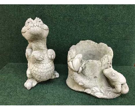 A frog planter together with a figure of a dragon