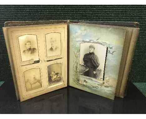 A Victorian embossed leather photograph album, containing mostly portrait photographs