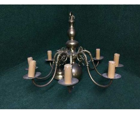 A brass eight branch chandelier 