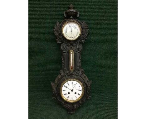 A Victorian cast iron barometer clock 