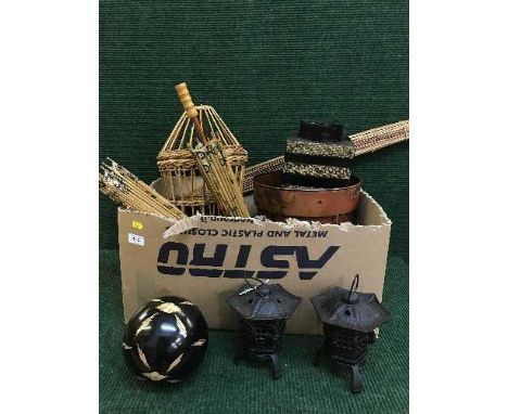 A box and basket of metal tea light holders, oriental resin figures, oriental parasols, contemporary vases etc 