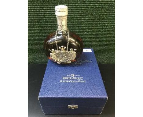 A boxed bottle of Whyte & Mackay 12 Years Old Blended Scotch Whisky, to commemorate the Wedding of Prince Charles and Lady Di