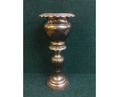 A heavy brass planter 