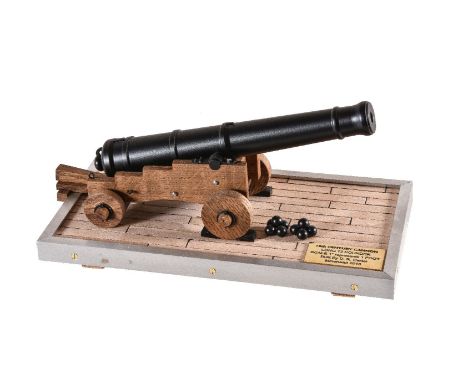 An exhibition quality model of a 18th Century 12 pounder Long Cannon, built by Mr D R Carter of Minehead, Somerset. In 1 inch