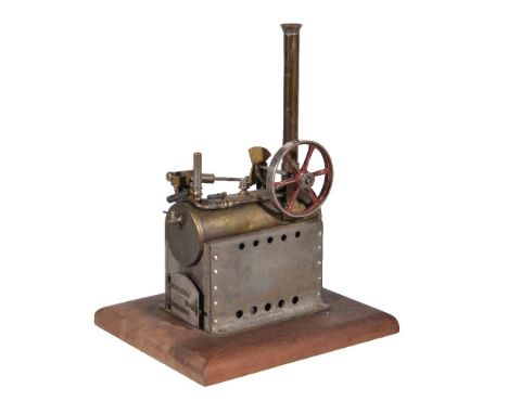 A Continental model of a toy horizontal steam plant, the boiler mounted on stand with firing door and having oscillating sing