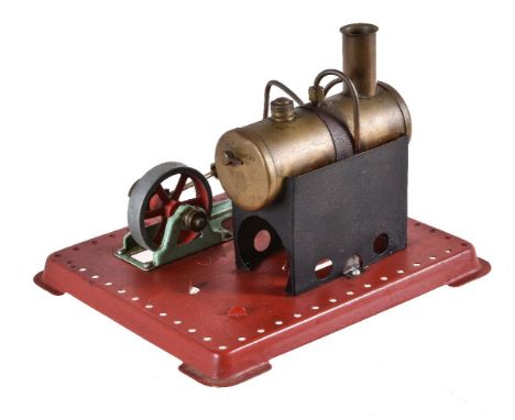 A Meccano steam plant, having single cylinder oscillating engine with flywheel and horizontal boiler mounted on rectangular b