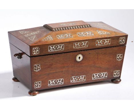 Victorian rosewood and mother of pearl inlaid tea caddy, of sarcophagus form, the hinged lid centred with a glass mixing bowl