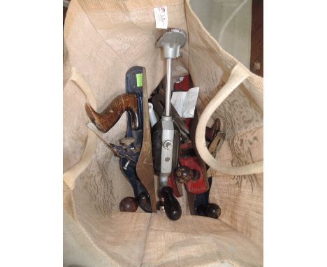 A selection of vintage woodworking tools including Record plane no. 5