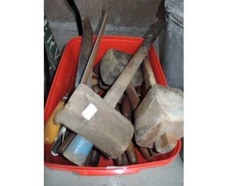 A selection of vintage woodworking tools including mallets