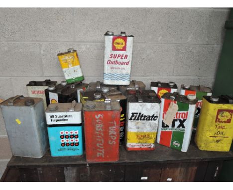 A selection of vintage fuel and oil cans including BP Castrol and Shell
