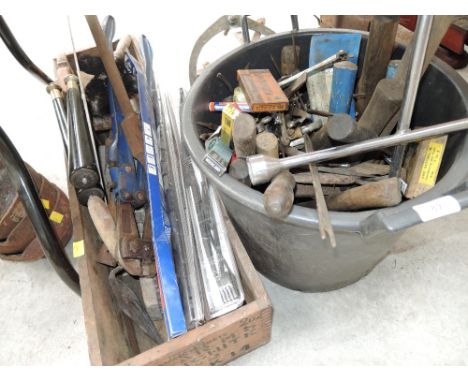 A large bucket of workshop tools sockets, spider wrench etc
