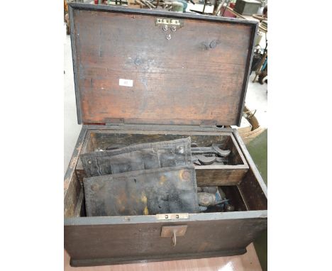 A selection of vintage spanners and engineers tools with chest