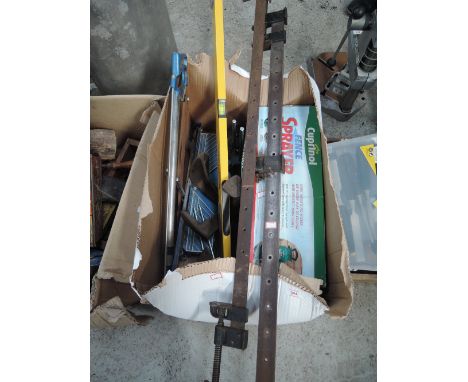A selection of vintage woodworking tools including Record sash clamps