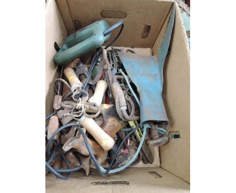 A selection of vintage gardening and similar tools