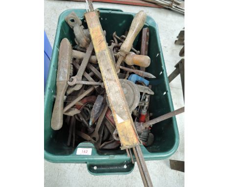A selection of vintage blacksmith and wood workers tools