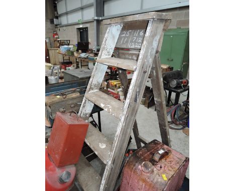 A set of vintage wooden step ladders