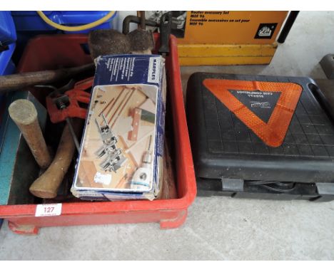 A box of various workshop tools