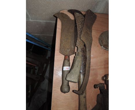 A selection of vintage hedging and fencing knifes and tools including Elwell