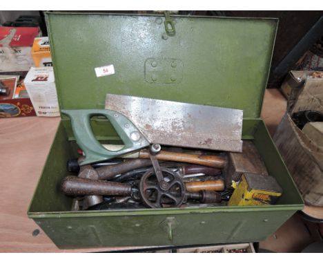 A selection of vintage tools and small metal chest
