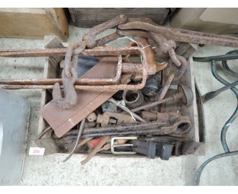 A selection of vintage cast tools and fitments